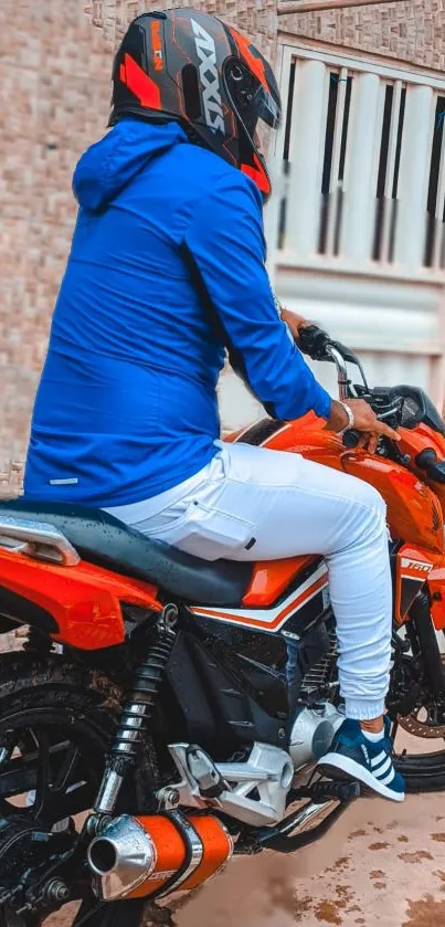 Motorcycle rider in vibrant urban setting with a blue jacket and red bike.