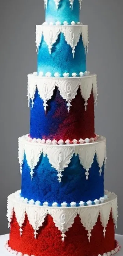 Colorful multilayer cake with red, blue, and white icing.