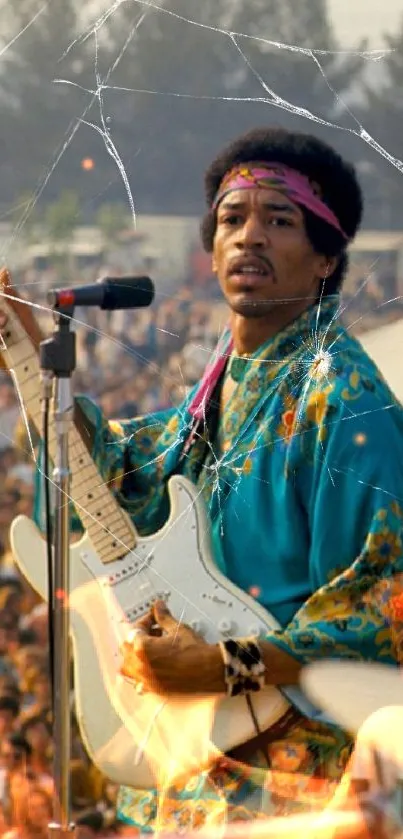 Iconic musician performing live at a vibrant festival with a crowd in the background.