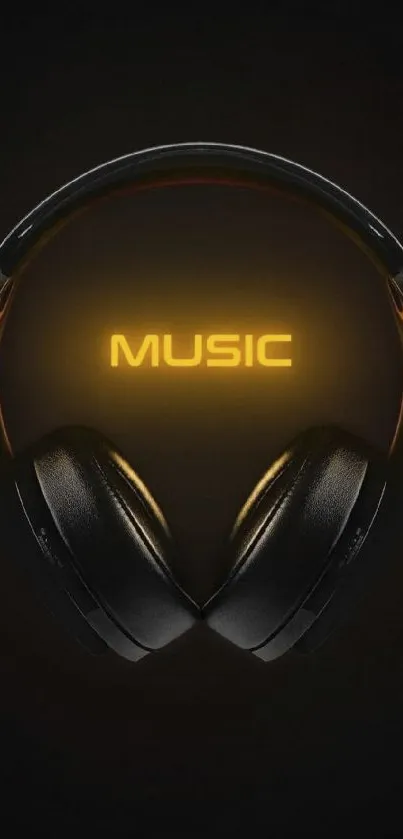 Stylish wallpaper with glowing yellow headphone design on black background.