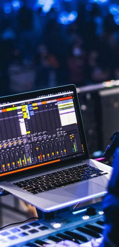 Laptop with mixing software at a live music event.