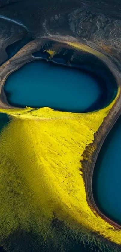 Aerial view of two lakes with vibrant yellow and blue colors.