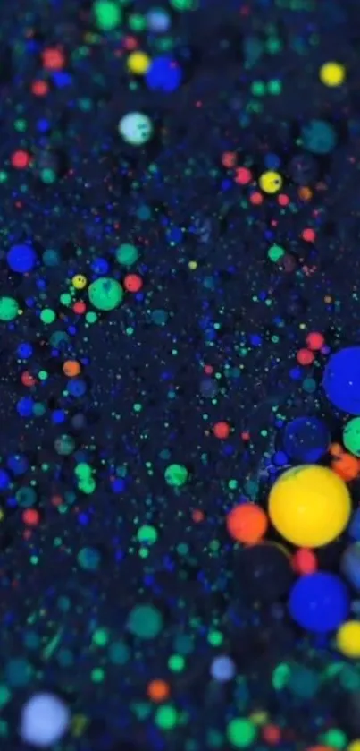 Colorful neon bubbles on a black background create a vibrant abstract wallpaper.