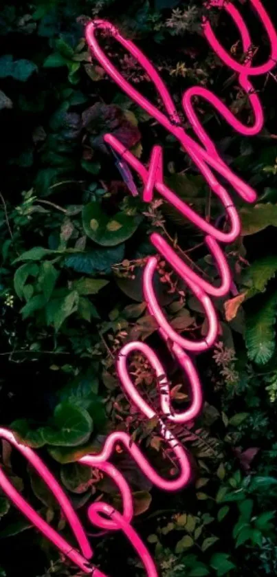 Neon 'breathe' sign on a green foliage background.