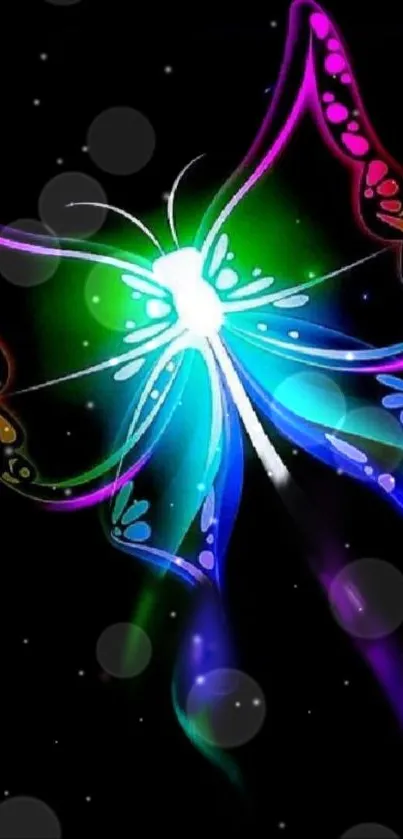 Vibrant neon butterfly art on black background.