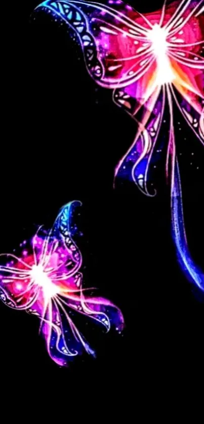 Vibrant neon butterflies glow on a black background, creating digital art beauty.