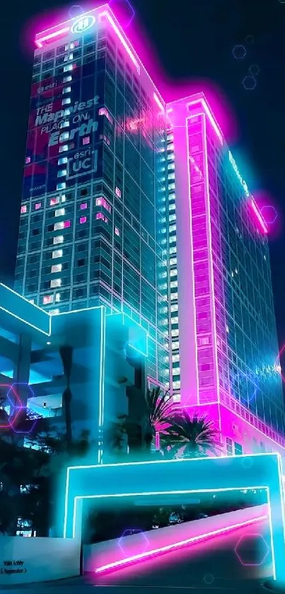 Vibrant neon-lit skyscraper against night sky wallpaper.