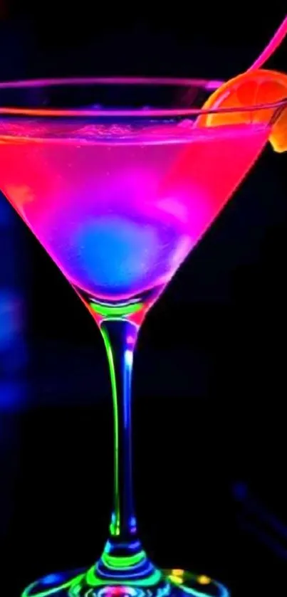 Vibrant neon cocktail with a citrus garnish in a dark setting.