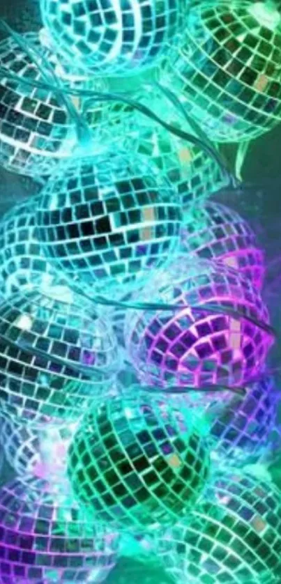 Vibrant neon disco balls in teal and purple glowing lights.