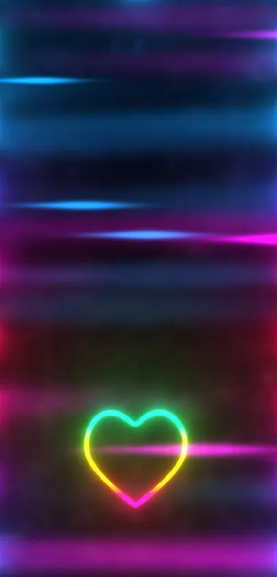 Neon heart glowing on black background with vibrant colors.