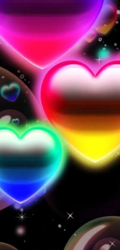 Vibrant neon heart wallpaper with colorful glowing hearts on a black background.