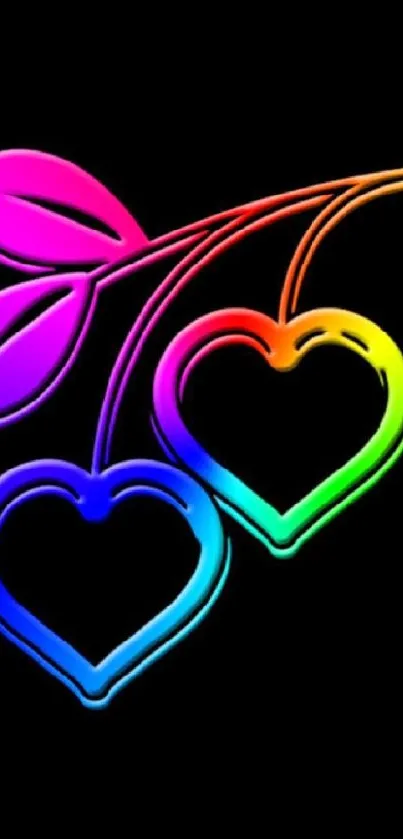 Colorful neon hearts on black wallpaper.