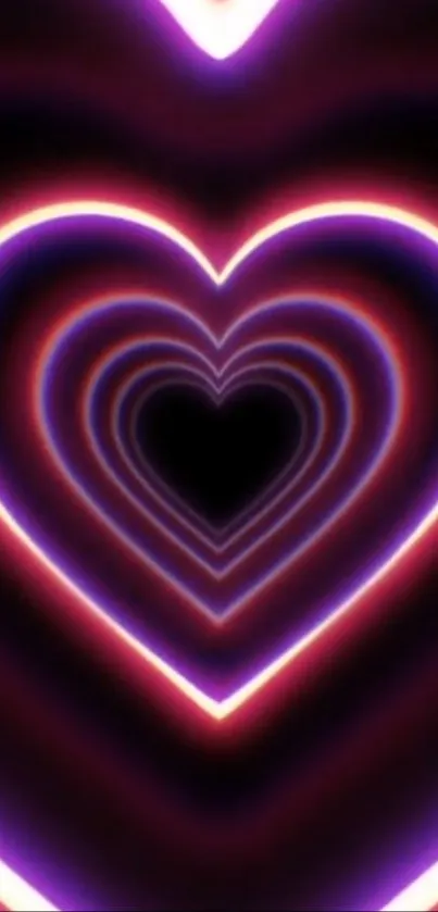 Vibrant neon wallpaper with glowing heart design in purple and pink hues.