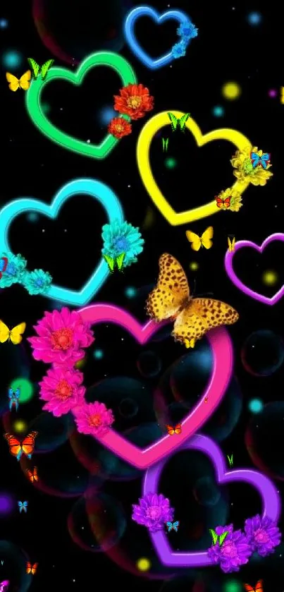 Vibrant neon hearts and butterfly on dark wallpaper.