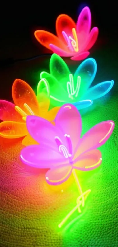 Colorful neon lotus flower wallpaper with glowing petals.