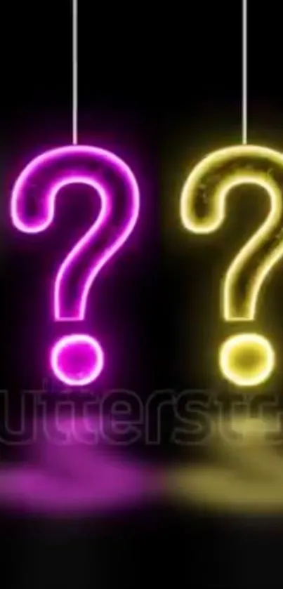 Vibrant neon question marks on black background.