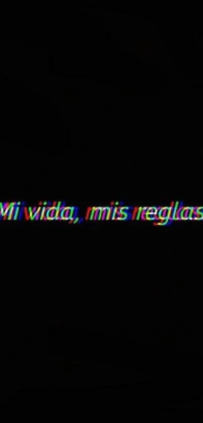 Vibrant neon text saying 'Mi vida, mis reglas' on a dark background.