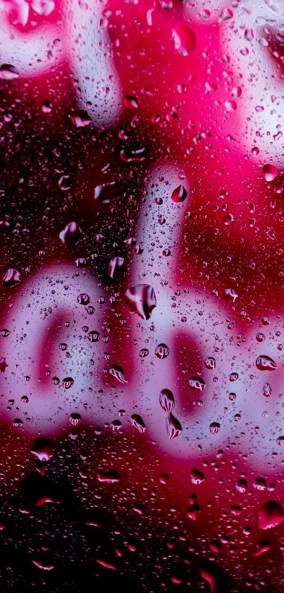 Close-up of neon and water droplets wallpaper, with vibrant pink and red hues.