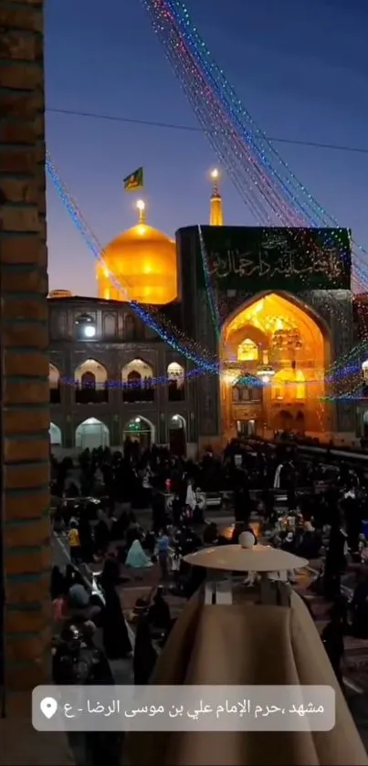 Night view of a holy shrine with glowing lights and a vibrant sky.