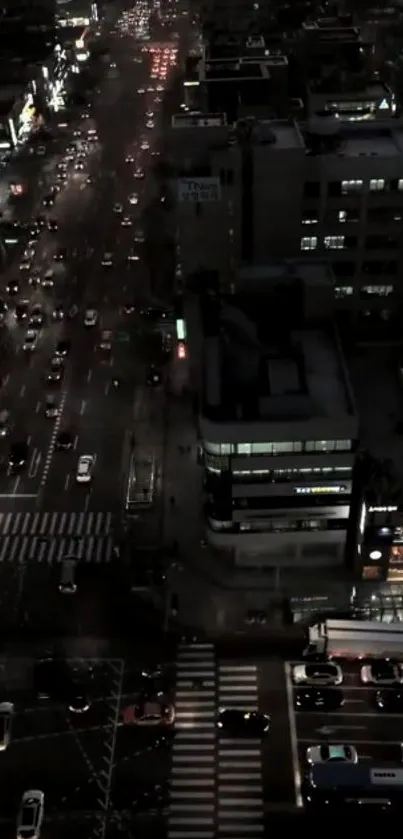 Nighttime cityscape with busy streets and glowing lights.