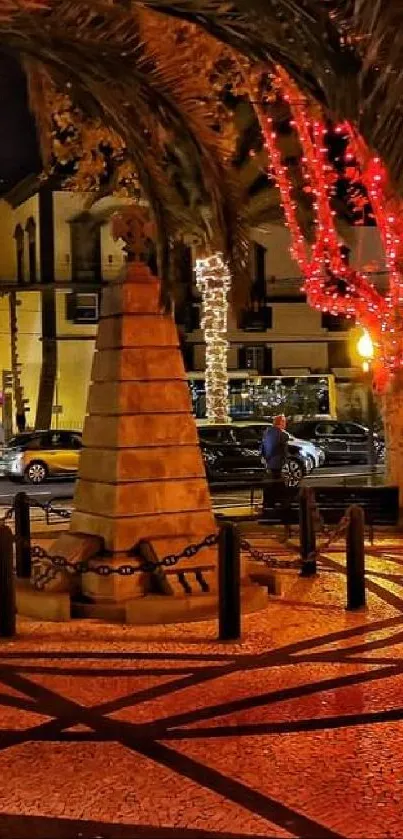 Vibrant city square at night with festive lights and palm trees.