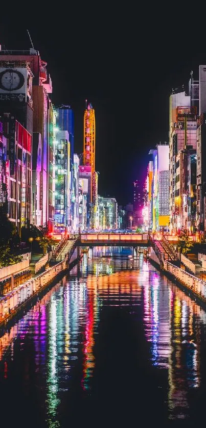 Colorful cityscape at night with vibrant neon lights reflecting on water.