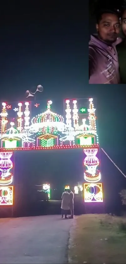 Colorful illuminated arch at festival night