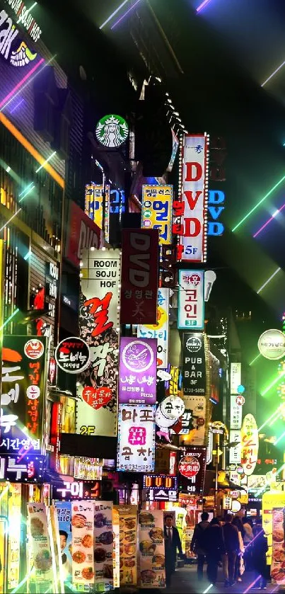 Vibrant city alley at night with colorful neon signs and lively atmosphere.