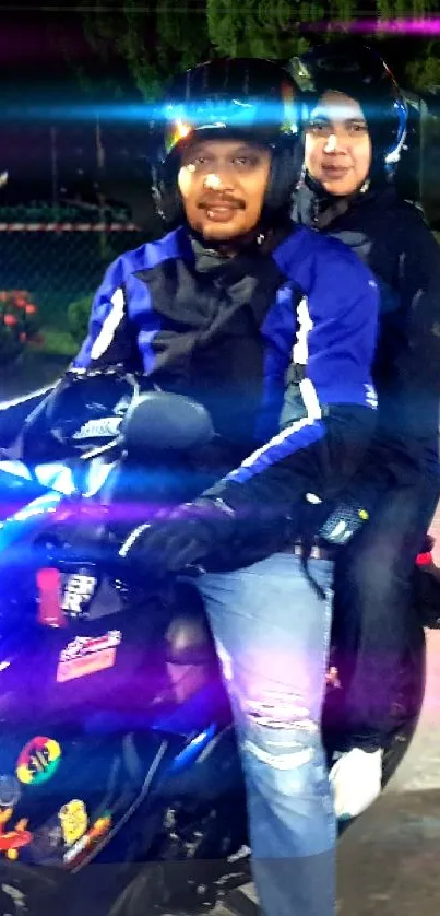 Motorcycle ride at night with vibrant neon lights.