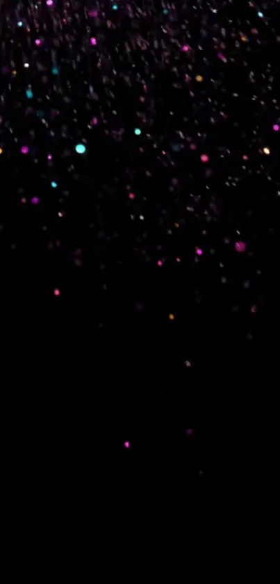 Colorful specks on a black night sky wallpaper, perfect for mobile.