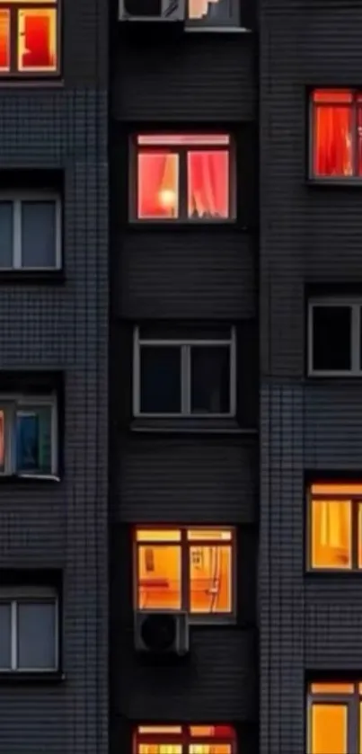 Illuminated building windows at night displaying vibrant colors.