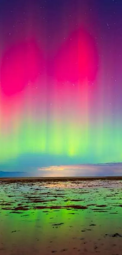 Mobile wallpaper of vibrant northern lights over a tranquil landscape.