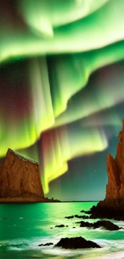 Vibrant northern lights over rocky coast at night.