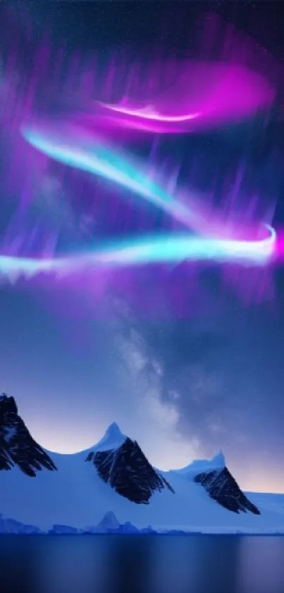 Northern lights over snowy mountains wallpaper with vibrant colors.