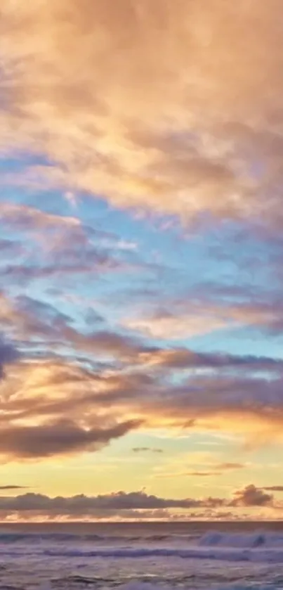 Vibrant sunset sky with ocean waves and colorful clouds.