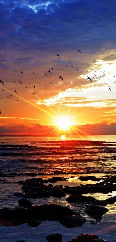 Vibrant ocean sunset with colorful sky and birds.