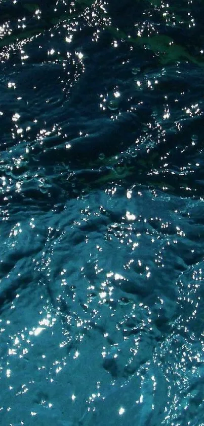 Deep blue ocean water with shimmering waves.