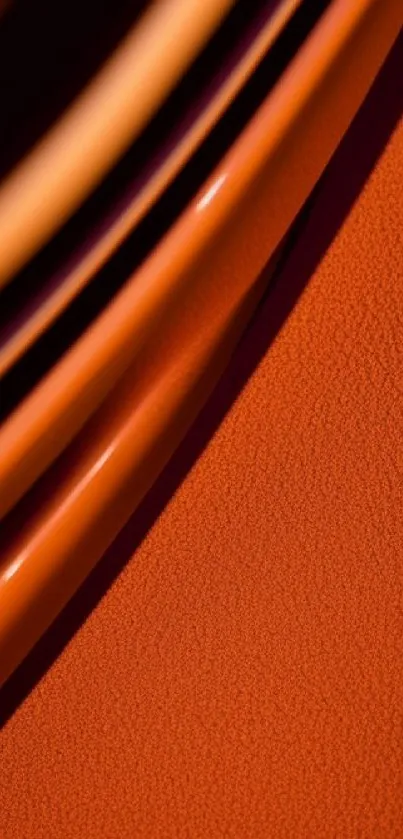 Vibrant orange abstract wallpaper with dynamic curves.