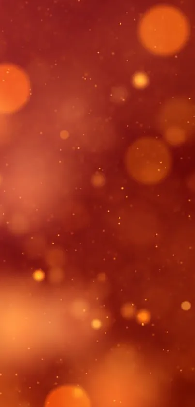 Orange bokeh wallpaper with glowing circular patterns and warm ambiance.