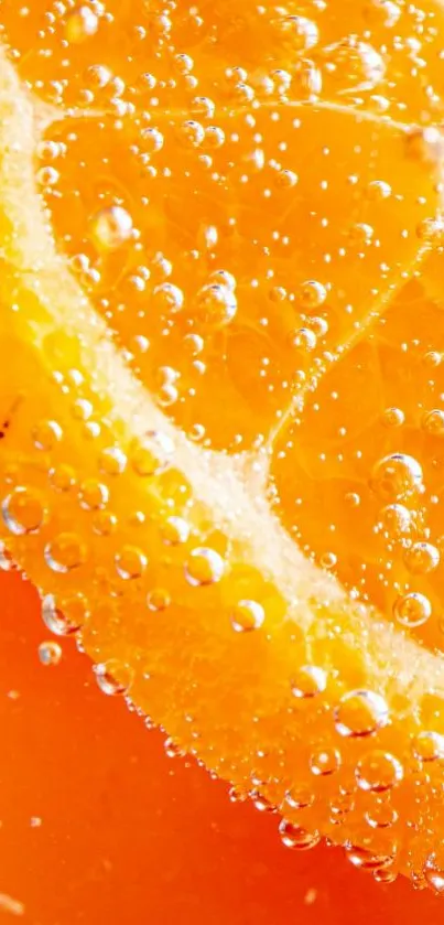 Close-up of orange slice with bubbles