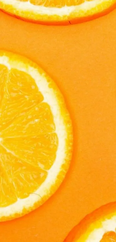 Bright orange citrus slices on vibrant background mobile wallpaper.