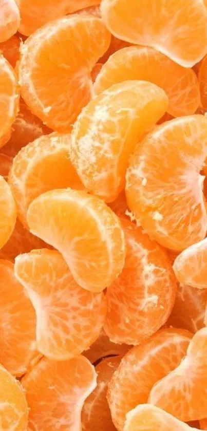 Close-up of vibrant orange mandarin slices creating a refreshing mobile wallpaper.