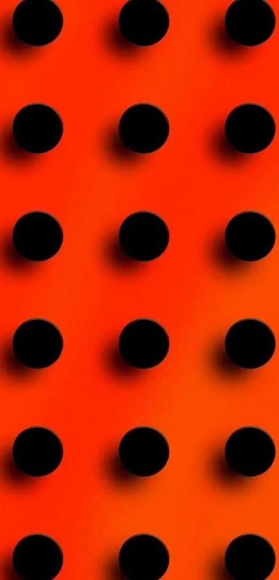 Orange wallpaper with bold black polka dots.