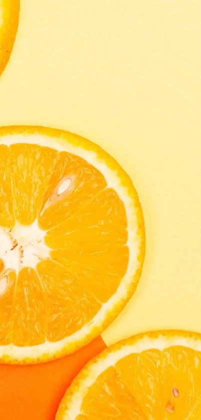 Orange slices on yellow background mobile wallpaper.