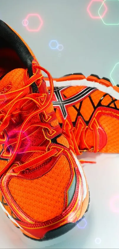 Bright orange sneakers with neon accents wallpaper.