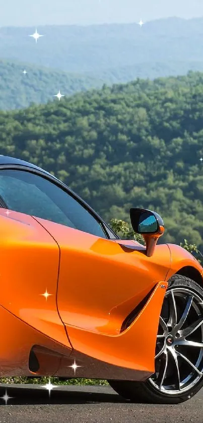 Vibrant orange sports car on scenic mountain road, ideal mobile wallpaper.