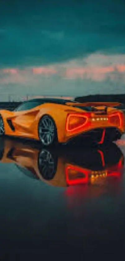 Orange sports car reflecting on wet pavement at night.