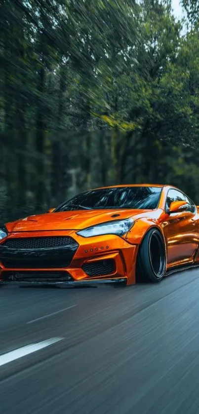 Vibrant orange sports car speeding on a scenic road.