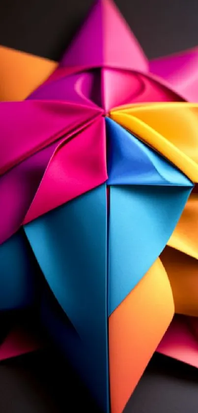 A colorful origami star design in pink, orange, and blue hues for a vibrant phone wallpaper.