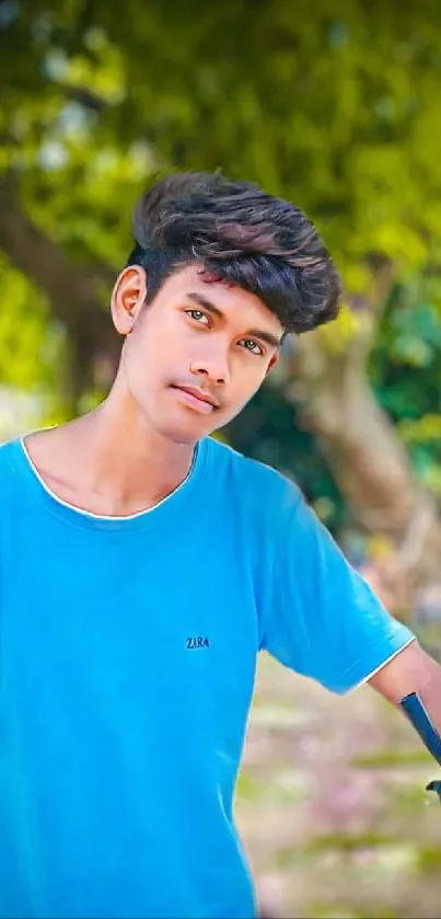 Young person in blue shirt with vibrant green background.